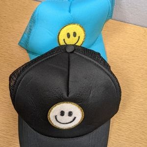 (2) smiley caps